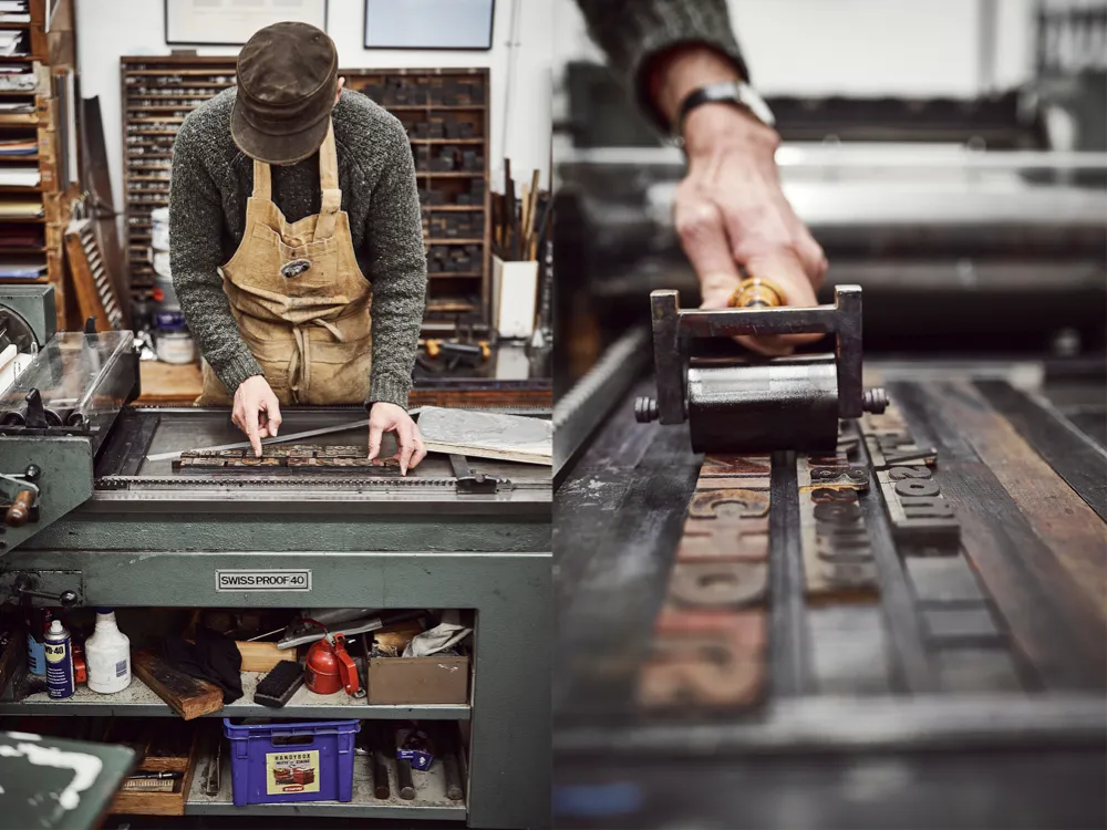 Nick Hand carefully sets type on a printer’s stone; Ink is applied to the type on the bed of the press