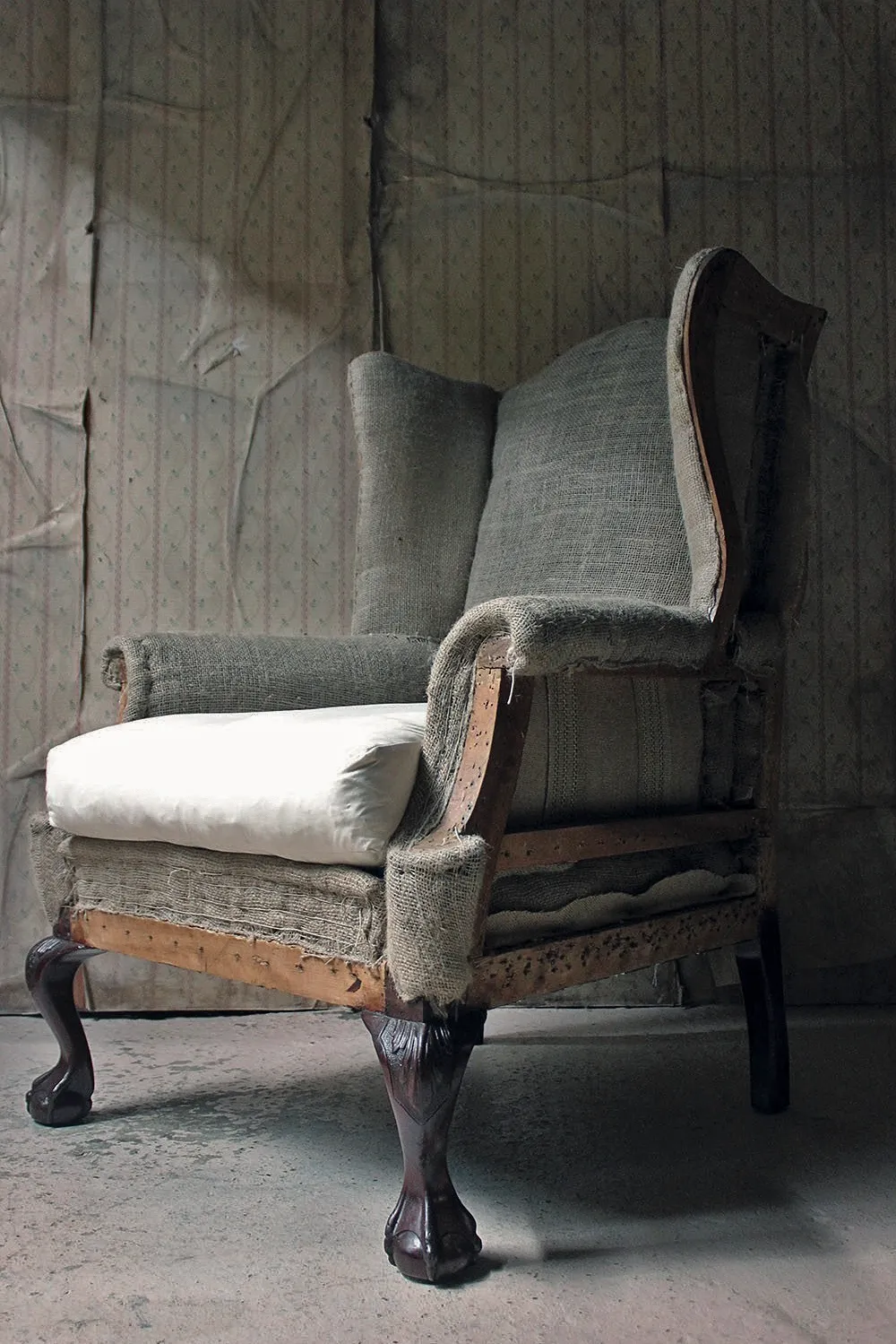 This Georgianstyle wingback armchair c1910 recently sold at Doe & Hope.