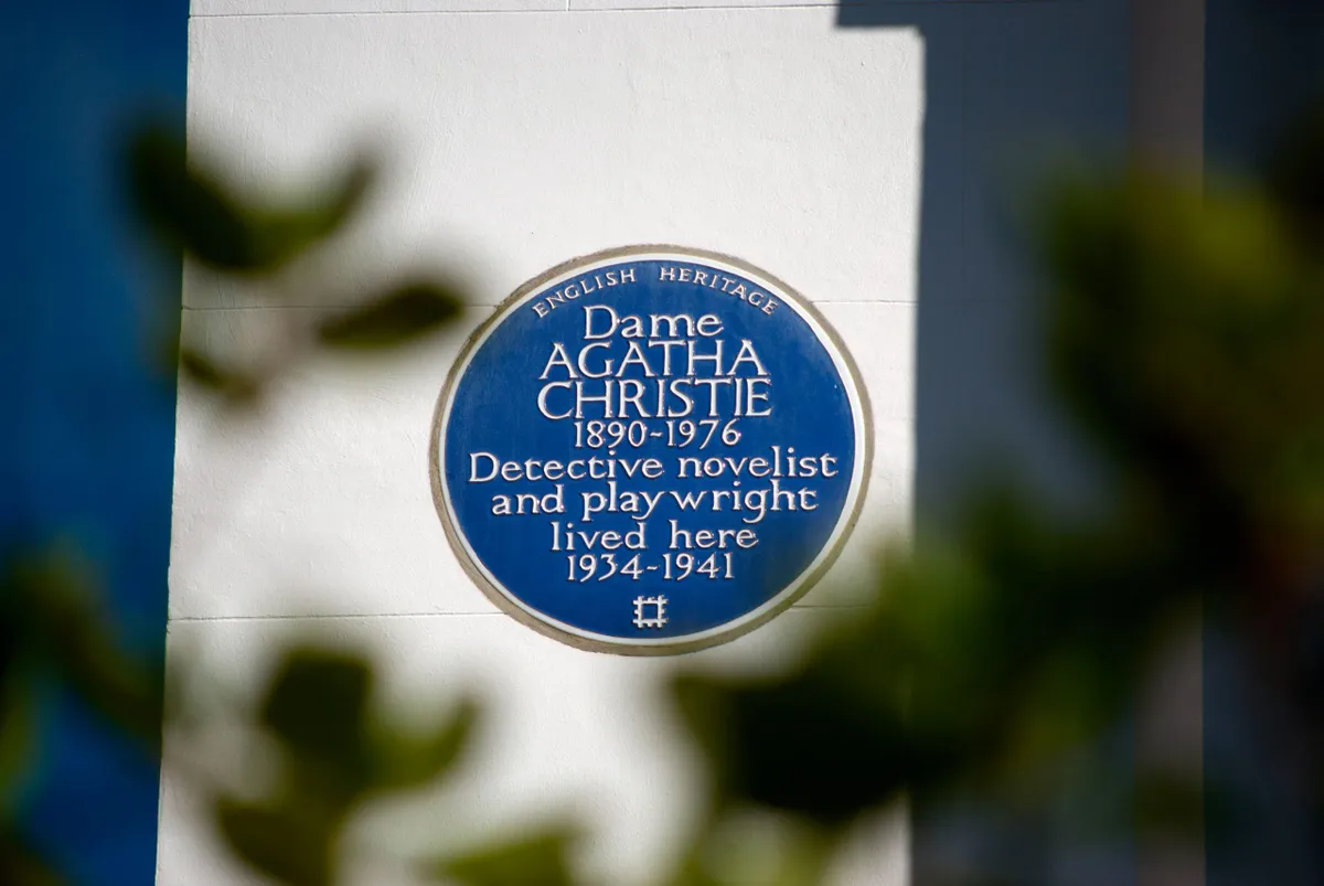 Blue plaque marking a former home of novelist Agatha Christie.