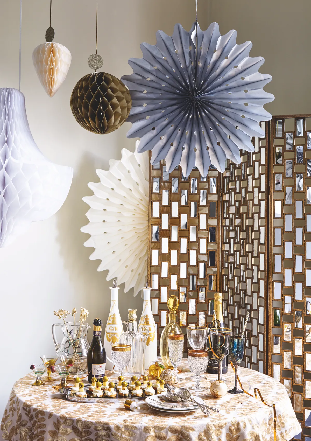 Hanging decorations, from £11 per pack, Talking Tables. 'Lempicka' screen, £995, OKA