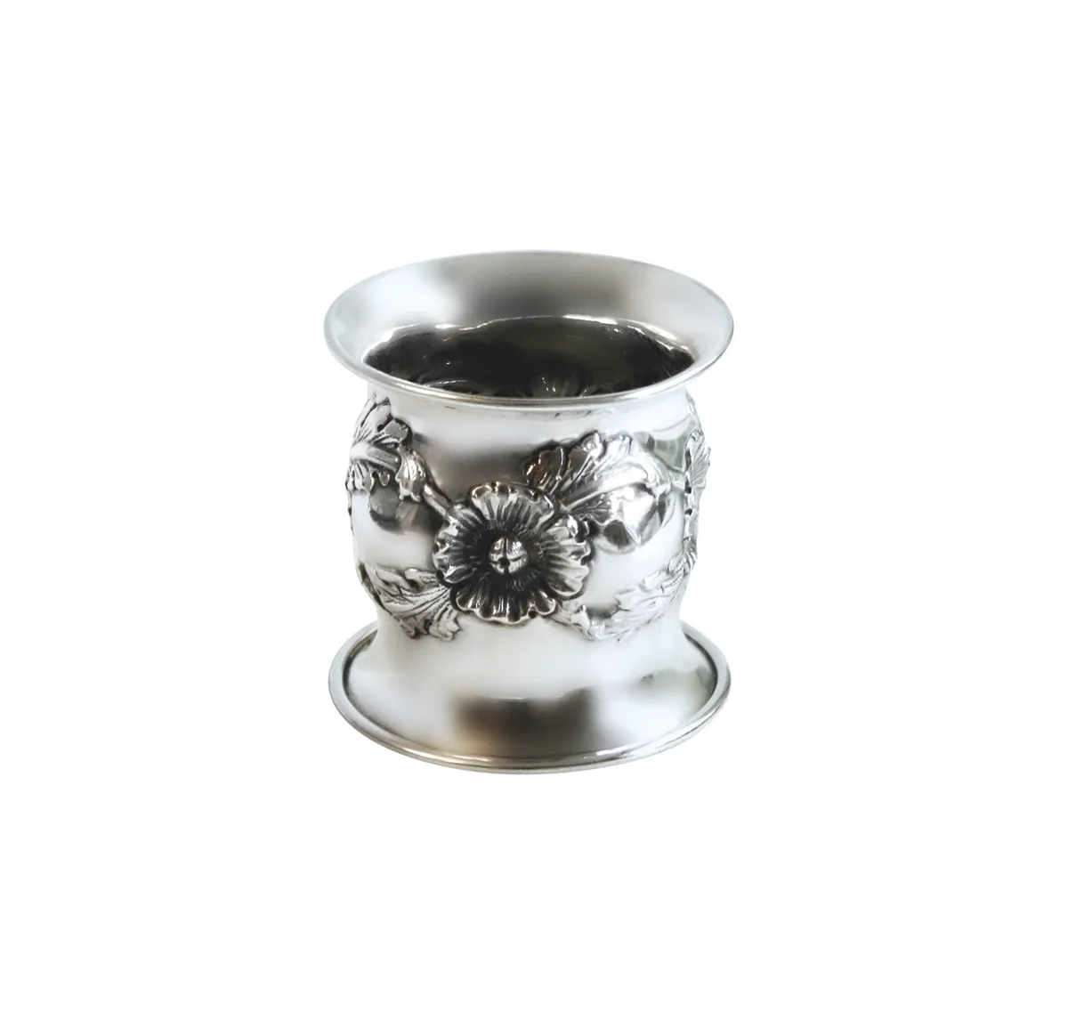 Sterling silver repoussé floral napkin ring, £204, French Garden House.