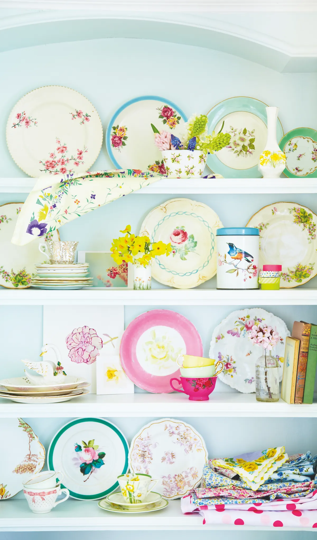 An eclectic array of vintage china makes a beautiful display on open shelving. Photography: Sussie Bell.