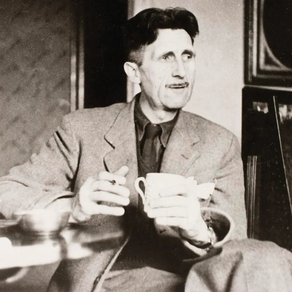 Photograph of George Orwell taking tea