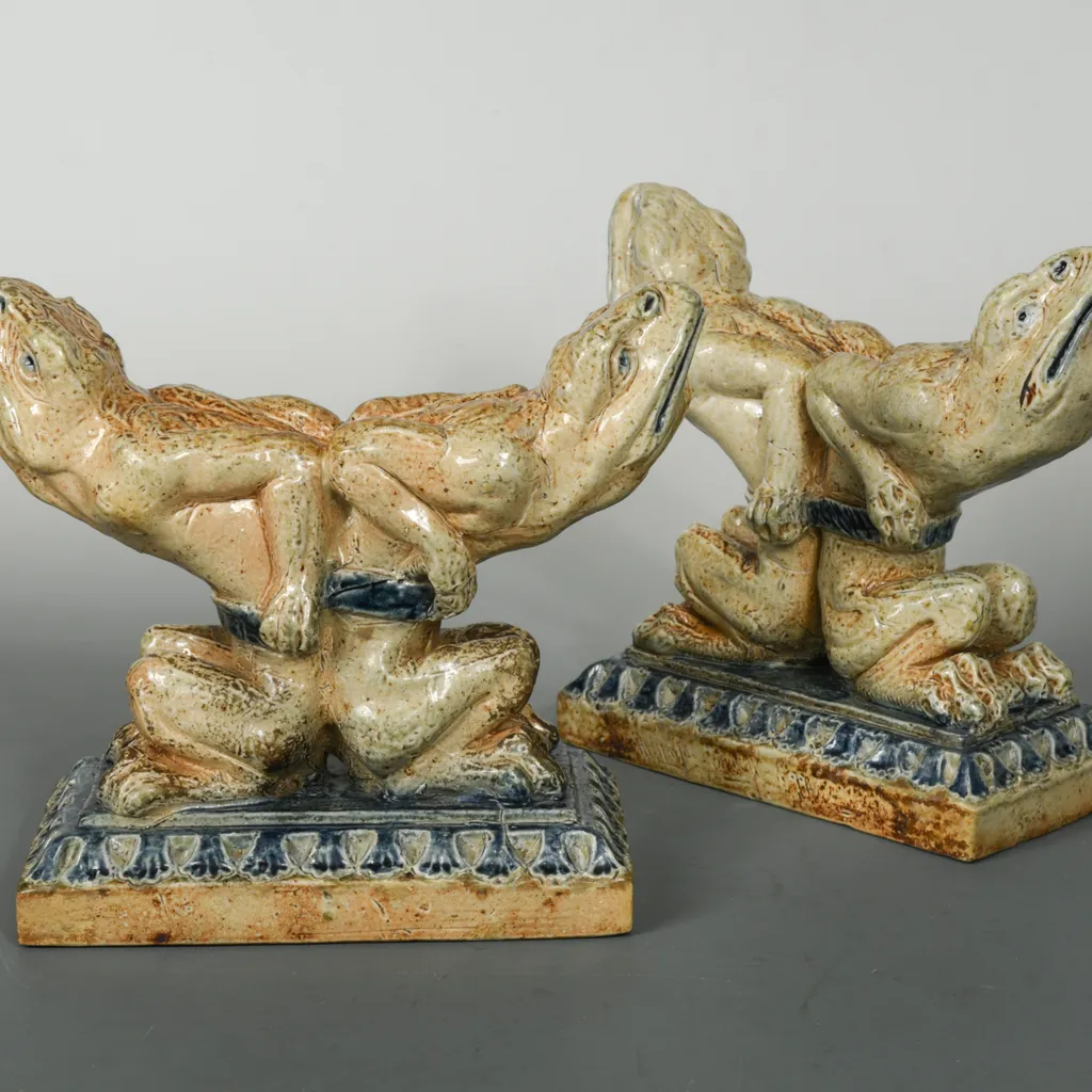 A highly rare pair of stoneware andirons in the form of grotesque amphibians carried an estimate of £50,000-£80,000 in Cheffins' Art & Design sale, February 2022.