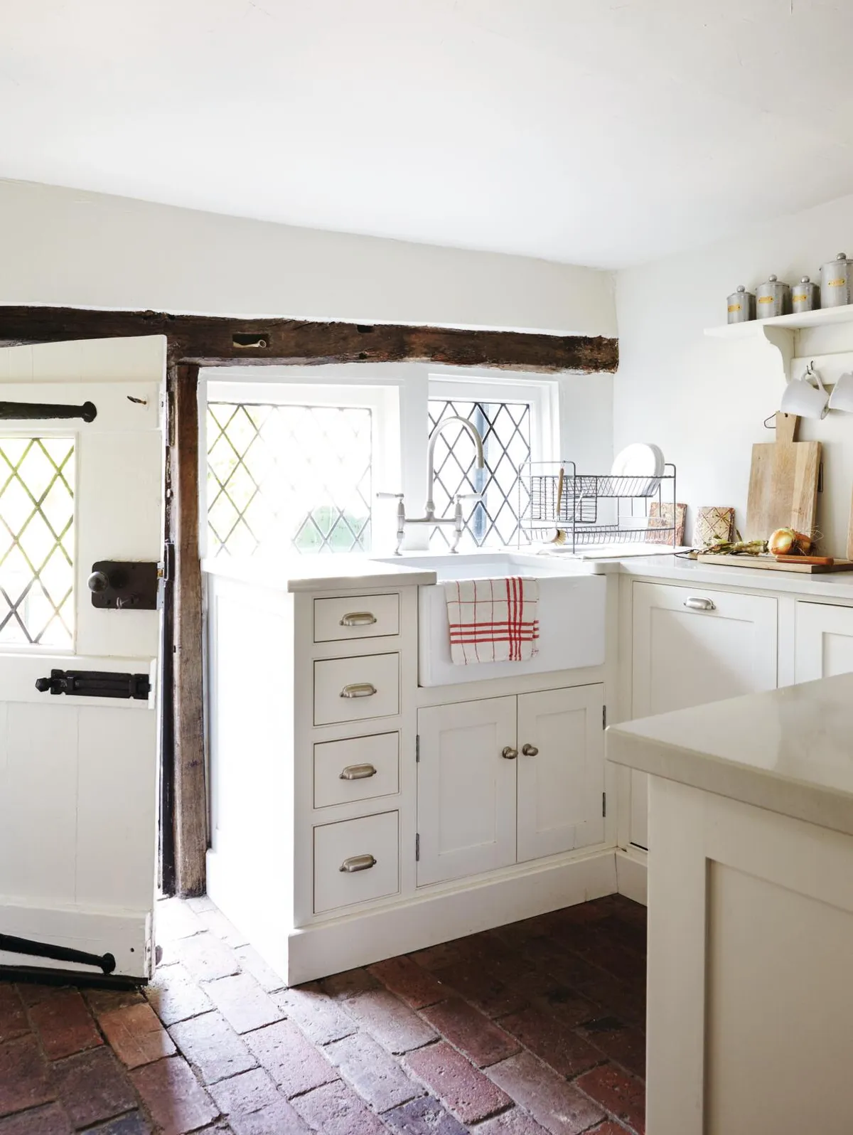 Tudor cottage, kitchen with open door