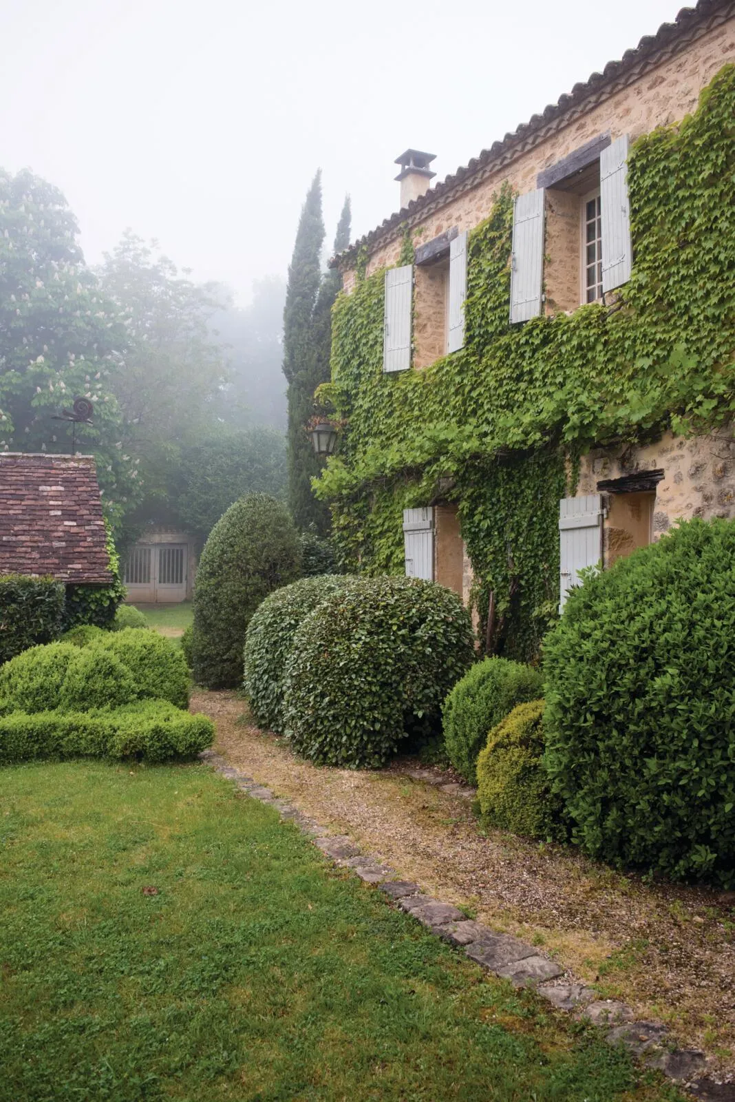 15th century farmhouse in south-west France, exterior and garden.