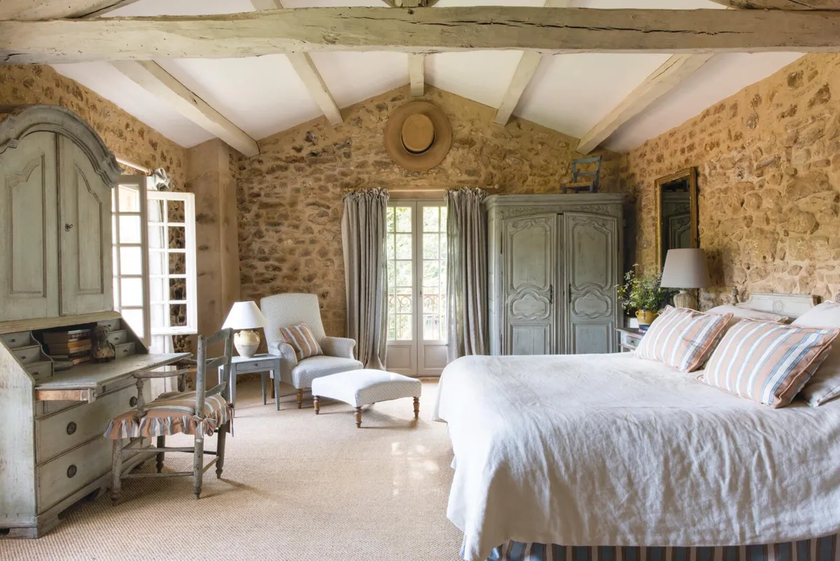 15th century farmhouse in south-west France, bedroom with study.