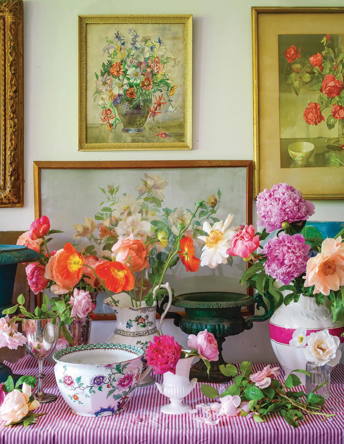 Wardington Manor: Poppies, Roses and Peonies in vases in the cutting room.