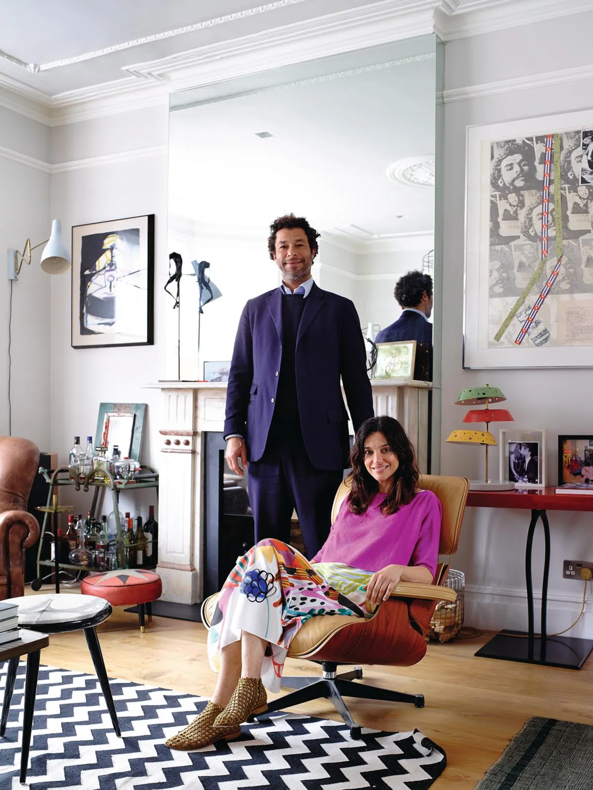 Colourful London home owners Alex and Mishari.