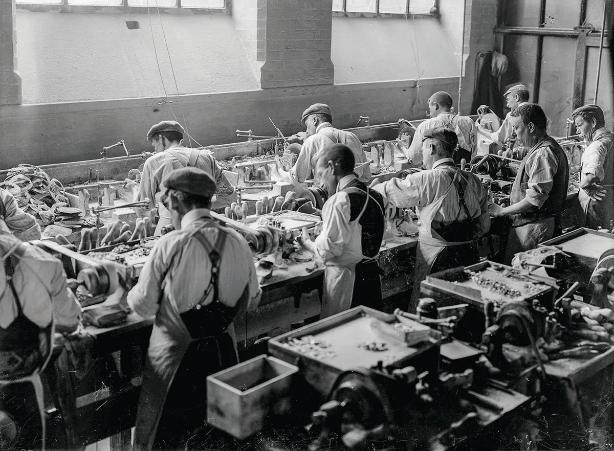 Workers in a button workshop in Birmingham.