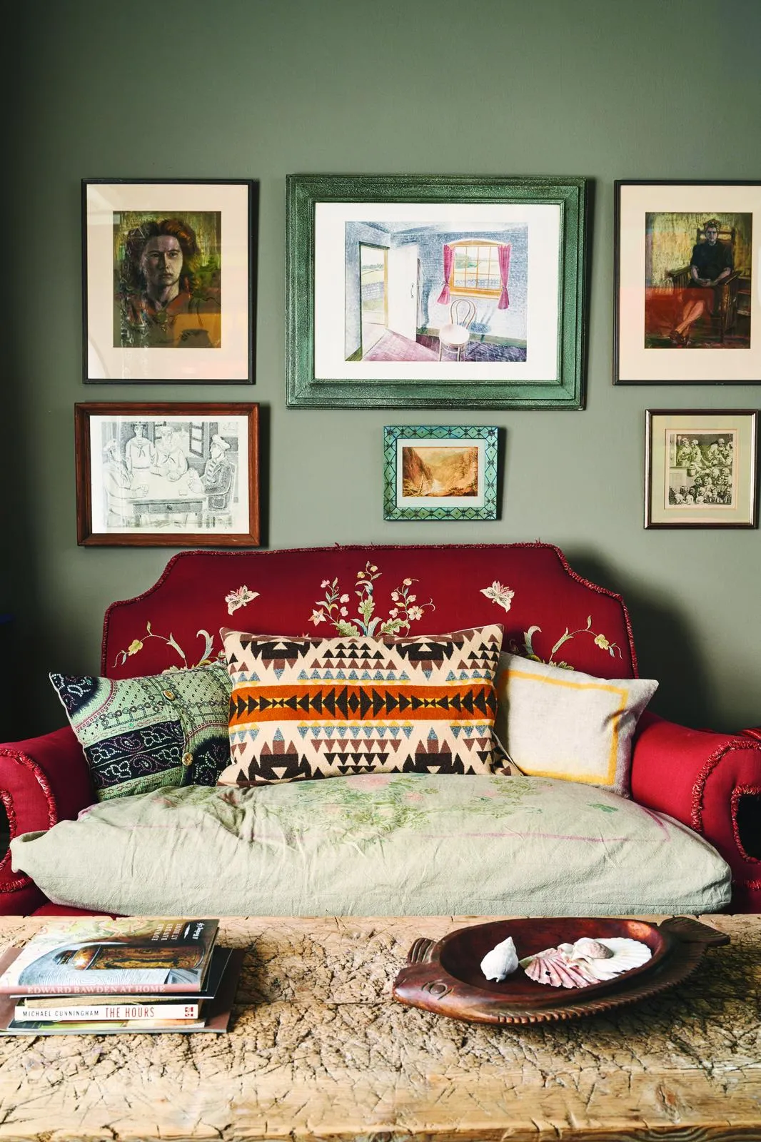 Annie Sloan's house, red sofa and artwork on the wall