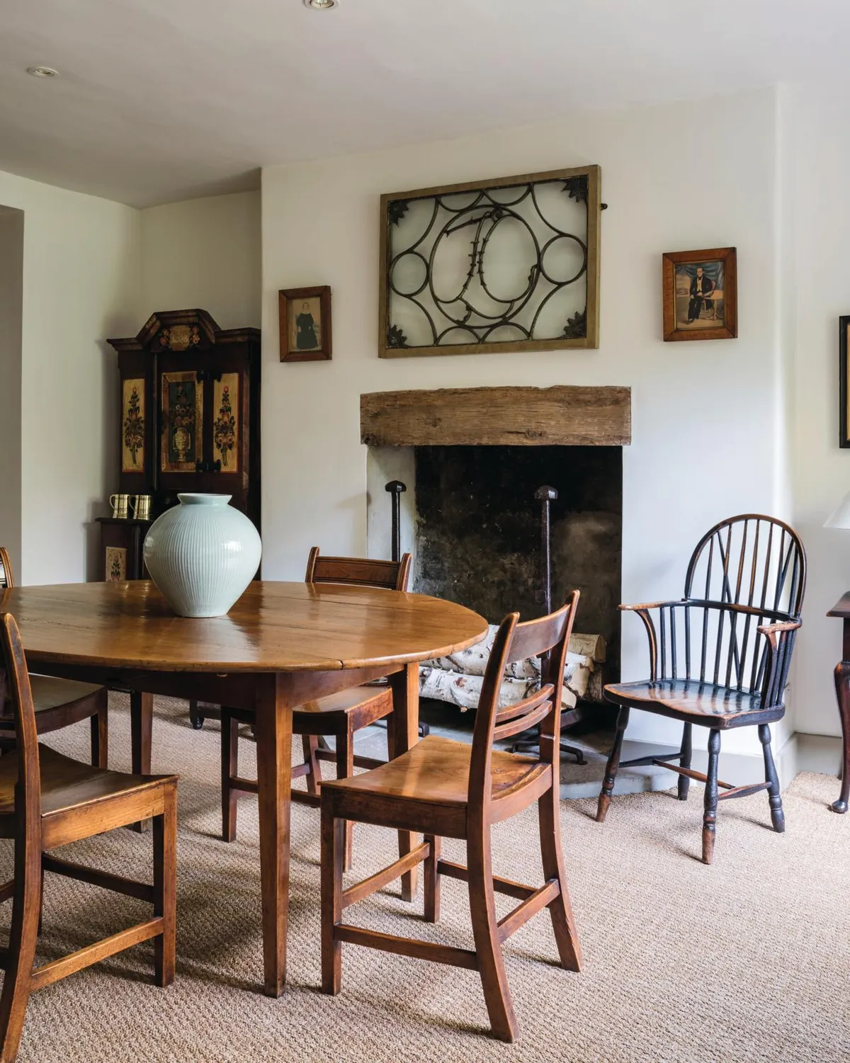 18th-century home, dining room table and fireplace.