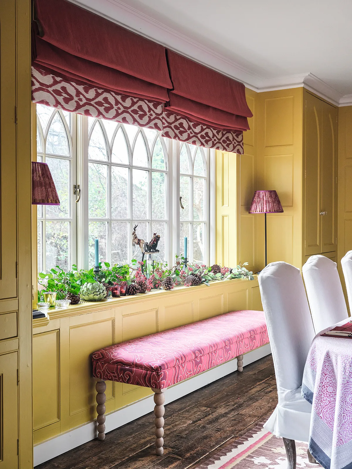 Elegantly eclectic home dining room window seat