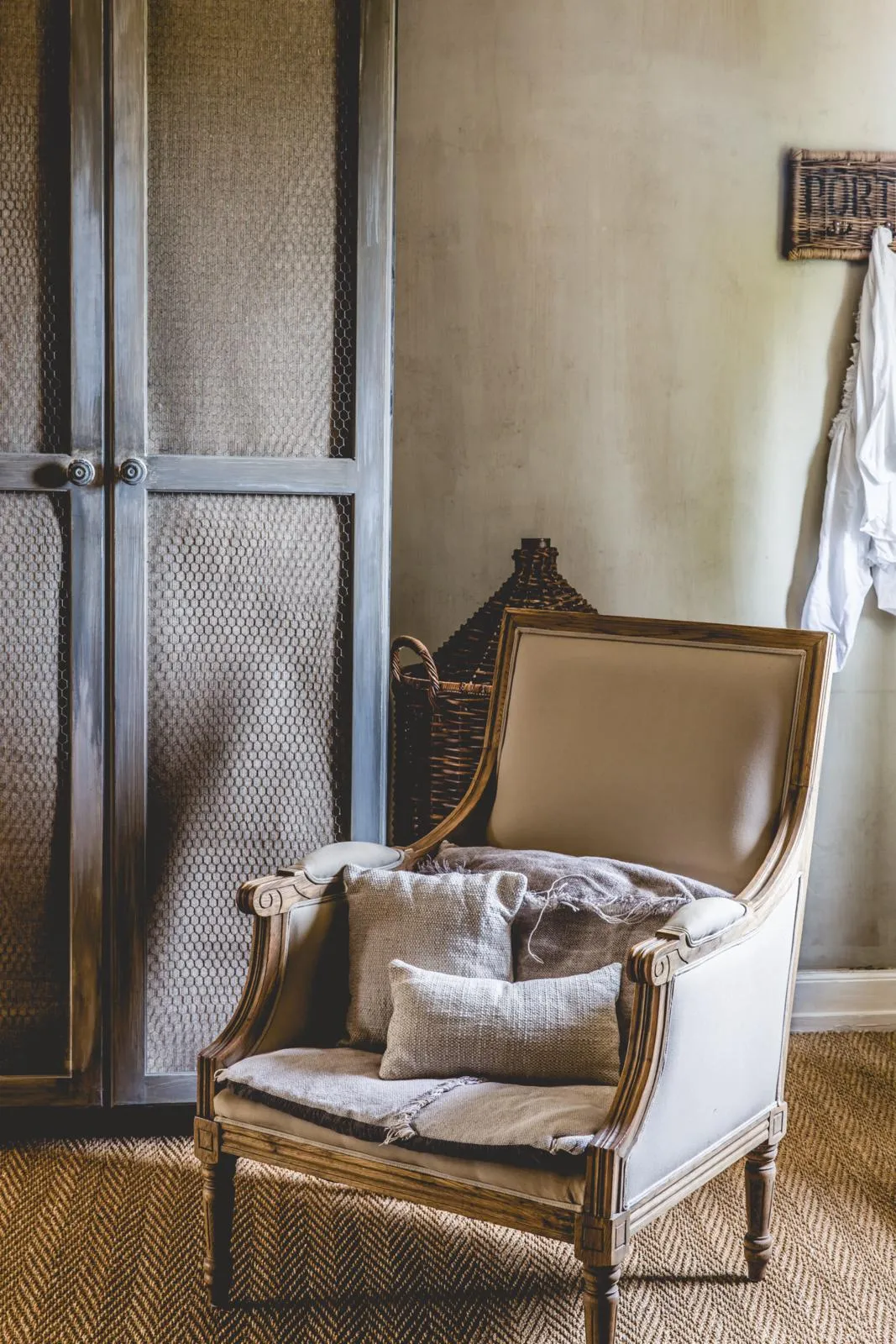 Restored coachman's cottage bedroom armchair