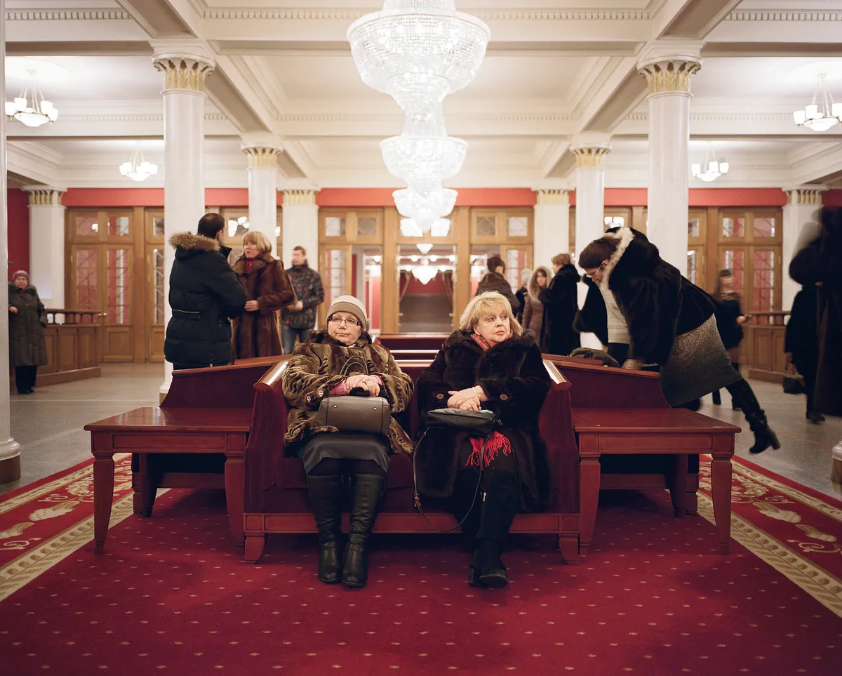 Concert-goers in the lobby of the Novosibirsk State Academic Opera and Ballet Theatre. When the opera house was being built, more than twenty-four million Russians, both soldiers and civilians, perished in the Great Patriotic War. That was enough dead to sell every ticket in its auditorium nearly twenty thousand times over – the equivalent of a full house every day for fifty-five years.