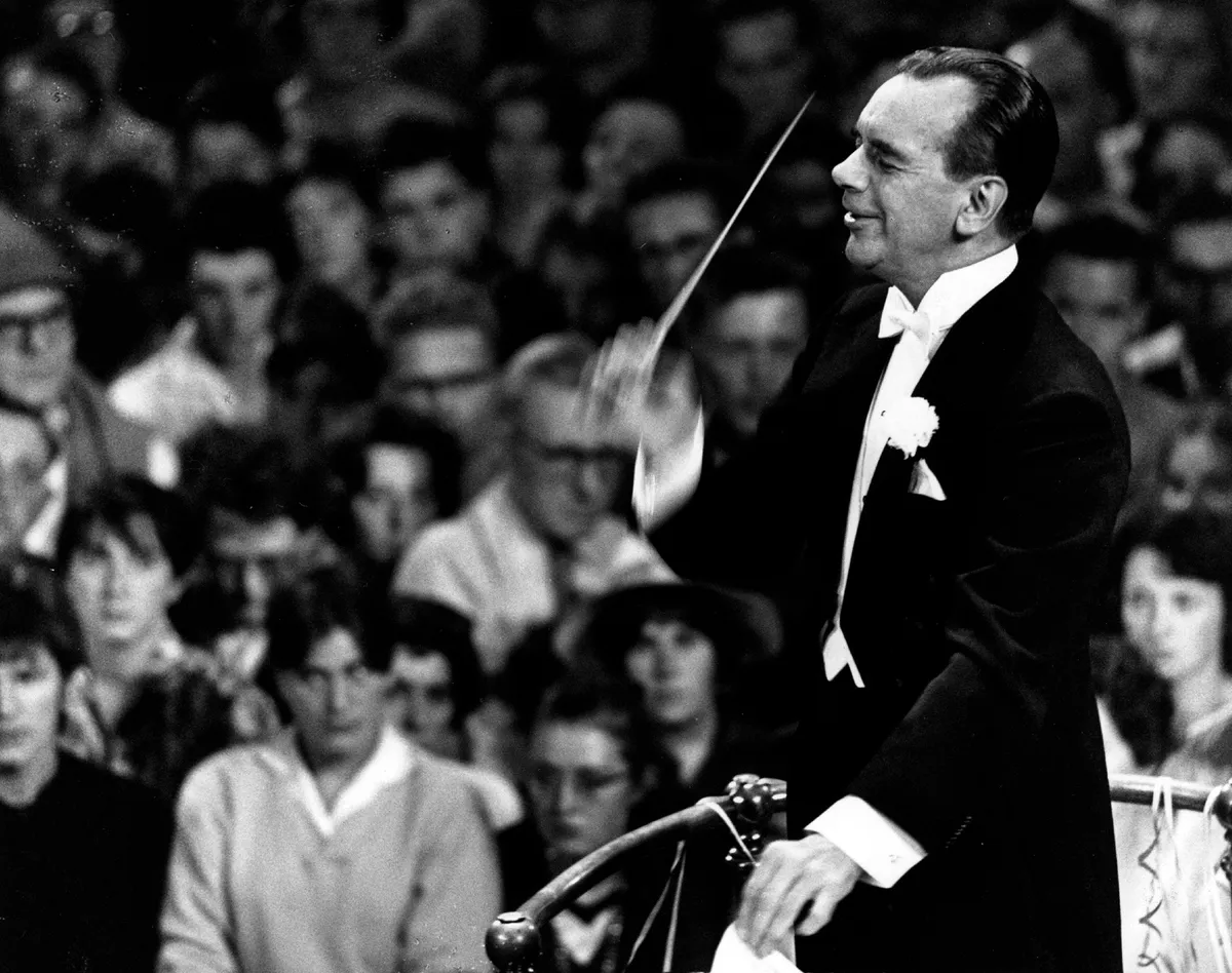 Sir Malcolm Sargent conducting a promenade concert. (Photo by Erich Auerbach/Getty Images)