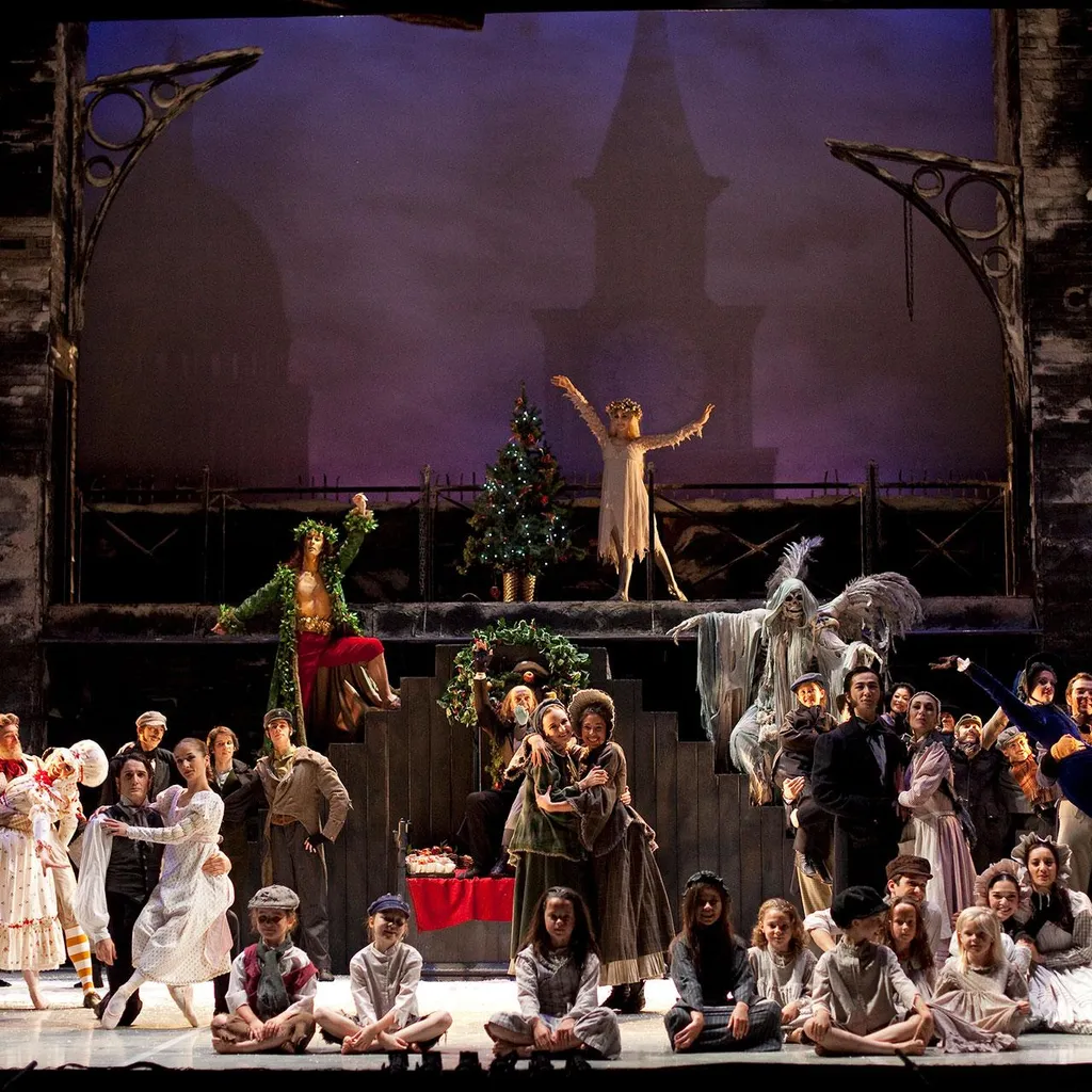 A production shot of Northern Ballet's 2009 production of A Christmas Carol, accompanied by live orchestra