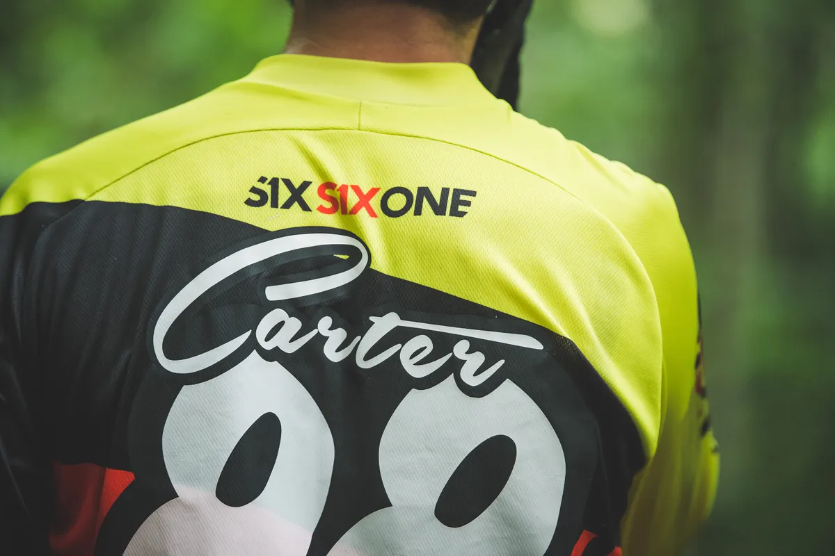 mountain biker race jersey with name and number on the back