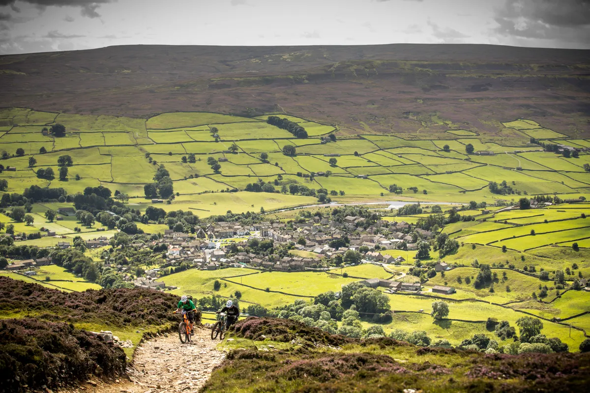 mountain bikers try to conquer one of the climbs at the Ard Rock enduro