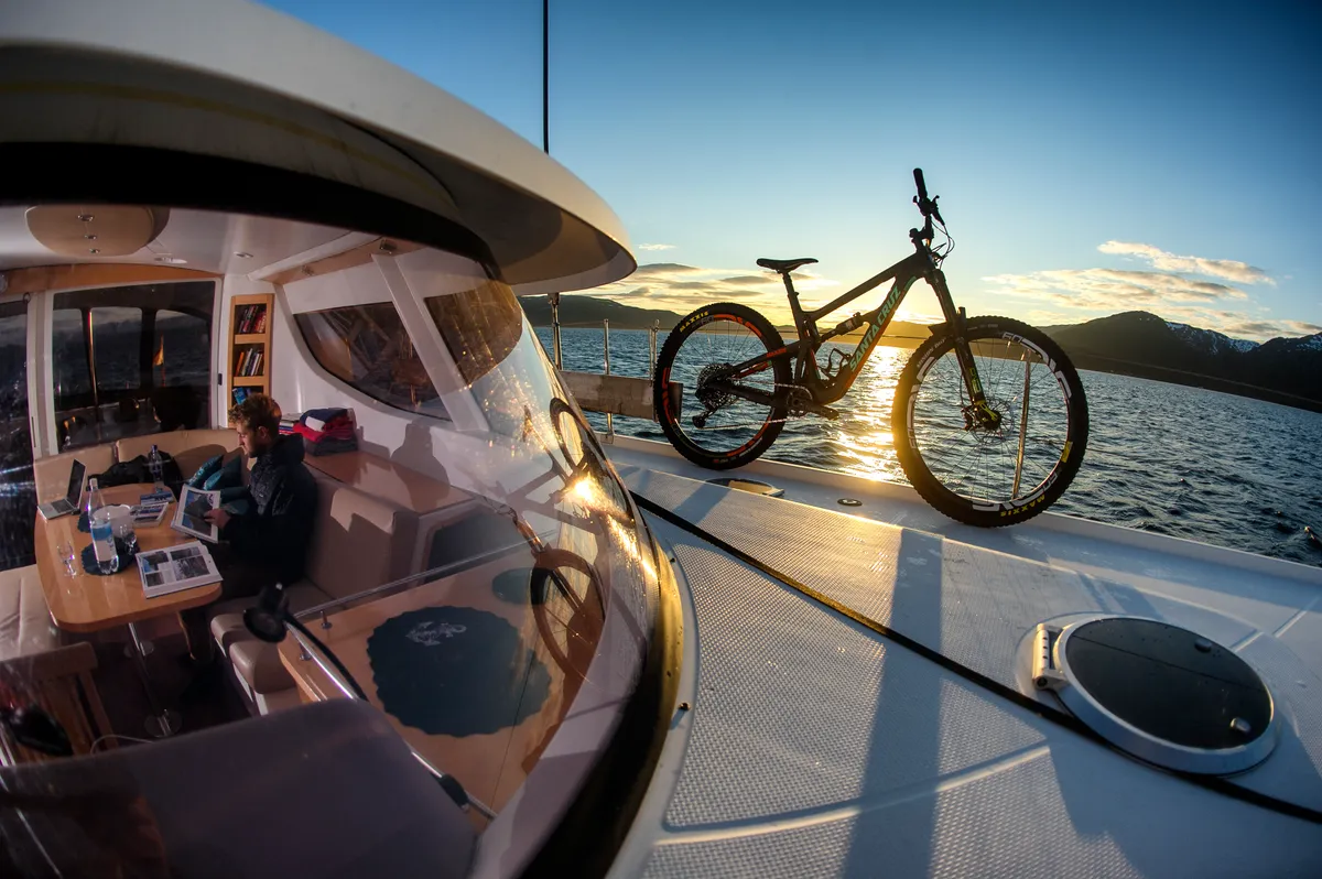 Bike on a yacht and a view inside the cabin