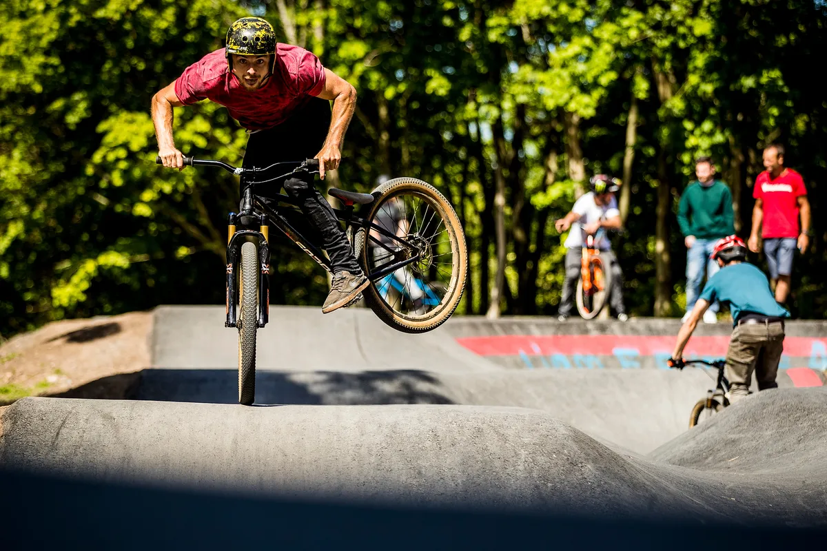 Olly Wilkins rides a hump roller at a pump track in Edinburgh