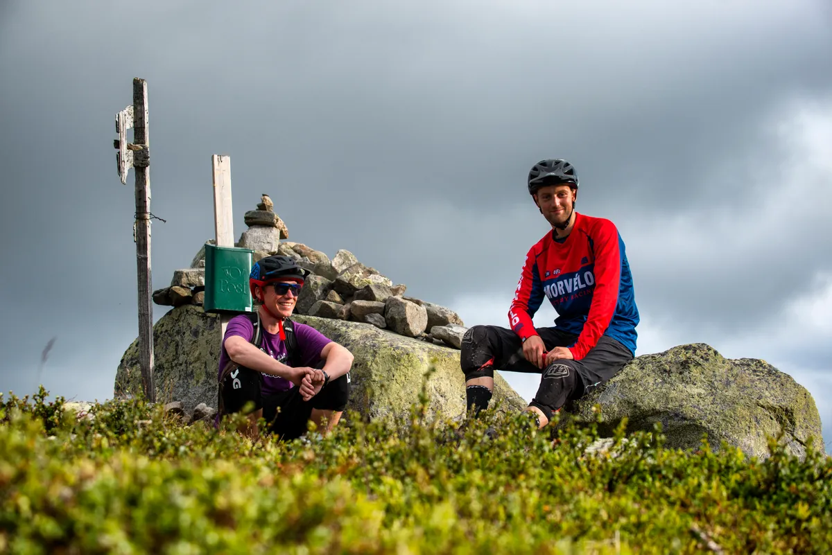 Sverre and our Ed take a quick break from the lung-busting climbs and bone rattling descents. Credit: Andy Lloyd
