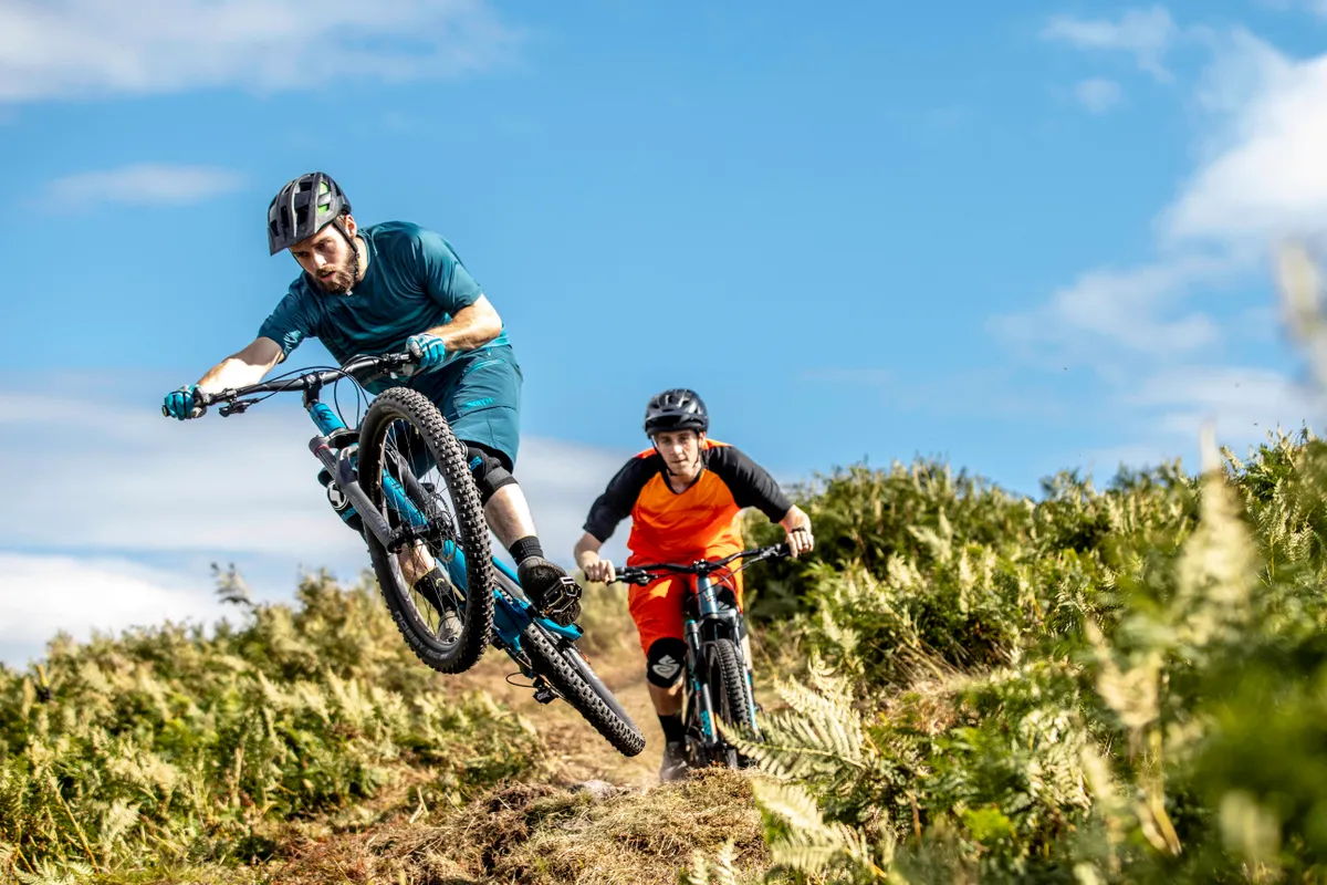 Four two-grand trail bikes tested bar to bar and head to head. Photo: Mick Kirkman