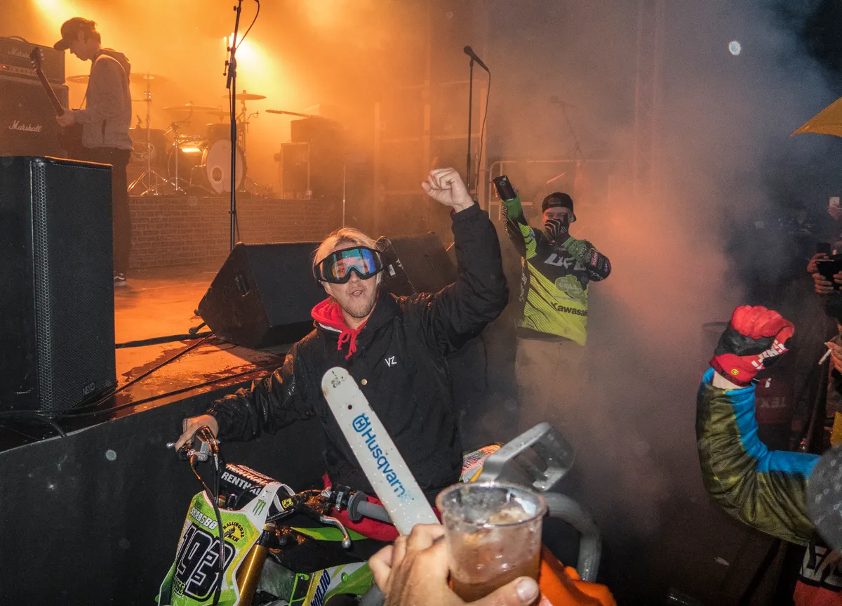 Rock 'n' roll, beer, MX bikes and chainsaws, it doesn't much more hillbilly than that. Photo: Andy Lloyd