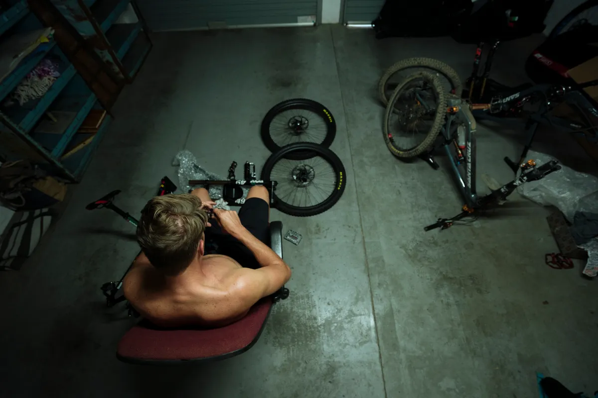 With his mechanic Marshy absent, Greg was forced to puzzle through the build of his own bike. Photo: Duncan Philpott