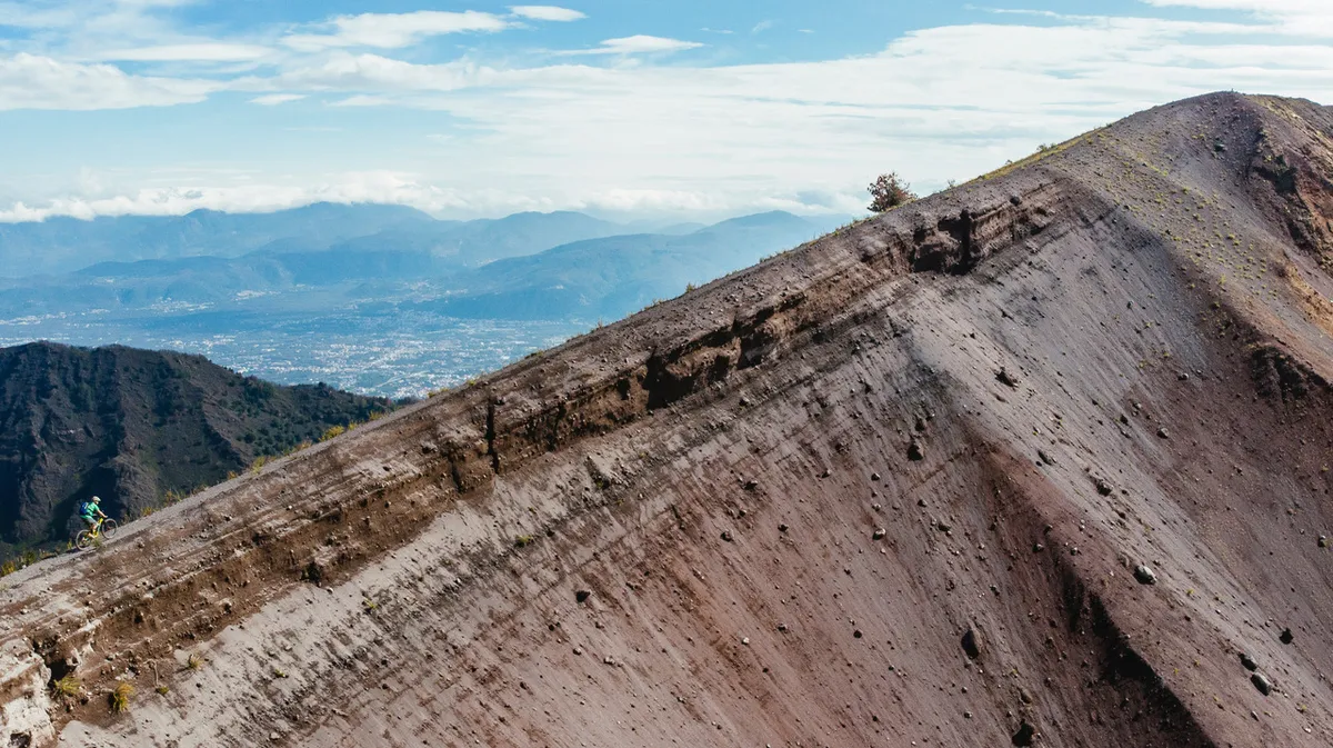 The crater on Mount Vesuvius is 305m deep and measures 610m across. The trail around the edge is not one for vertigo sufferers. Photo: Martin Bissig