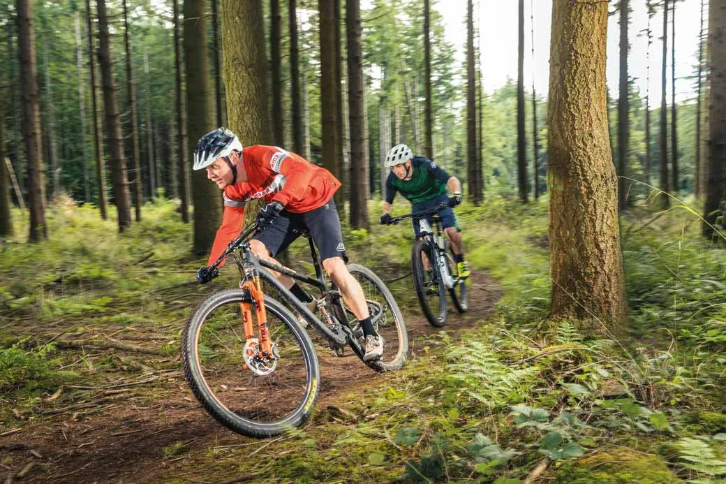 Four race-ready XC full-sussers put through their paces in this month's biketest. Photo: Russell Burton