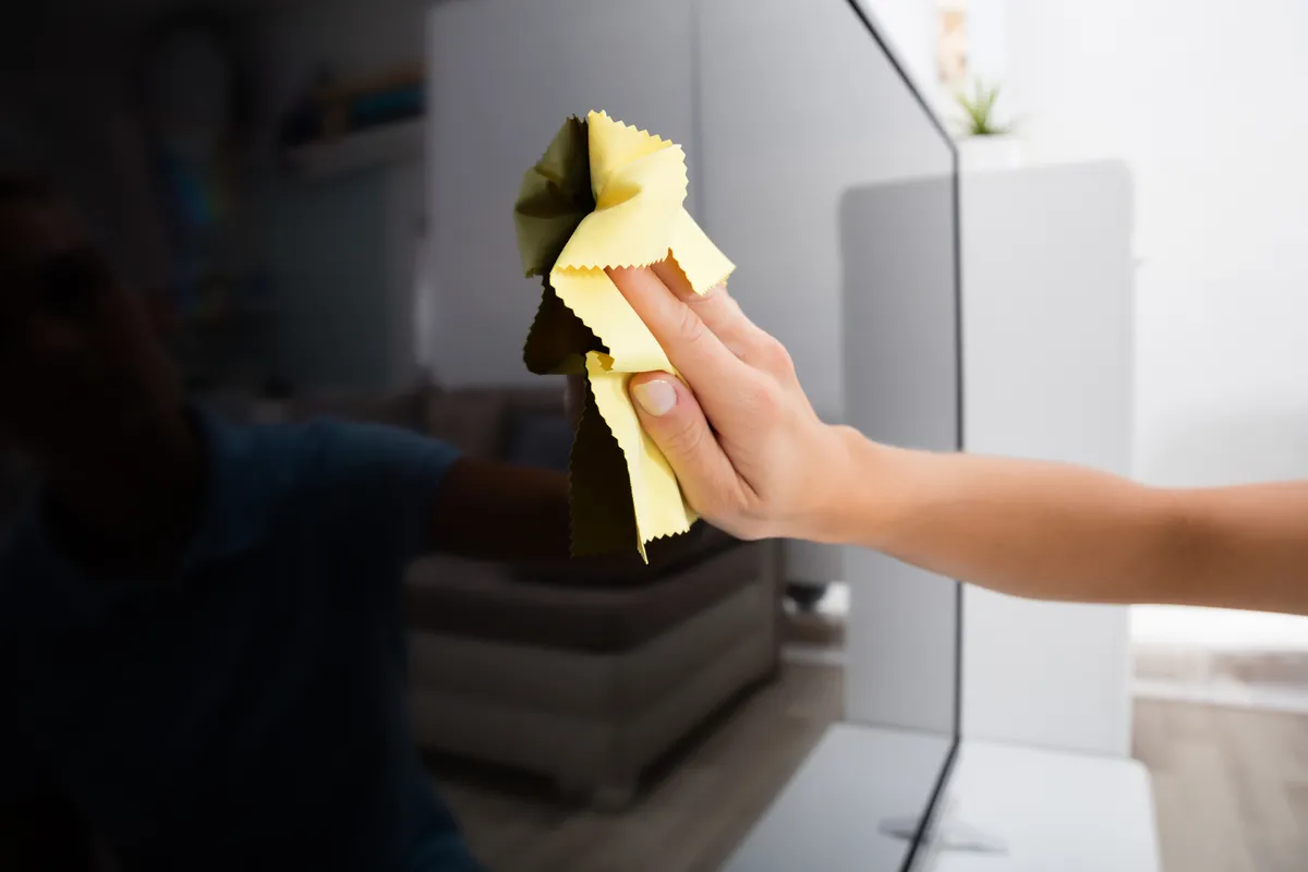 Microfibre cloth cleaning TV