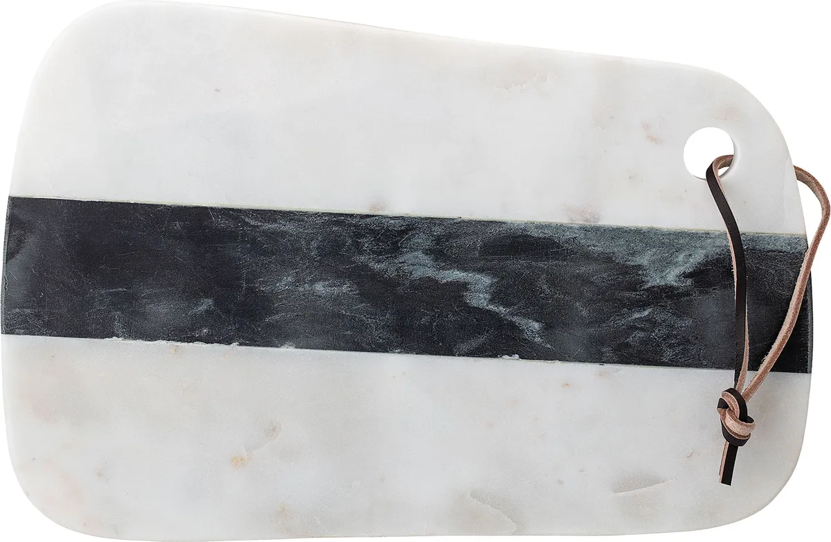 Combine luxurious textures with this mixed marble board featuring a leather strap detail. £31 from Cult Furniture 