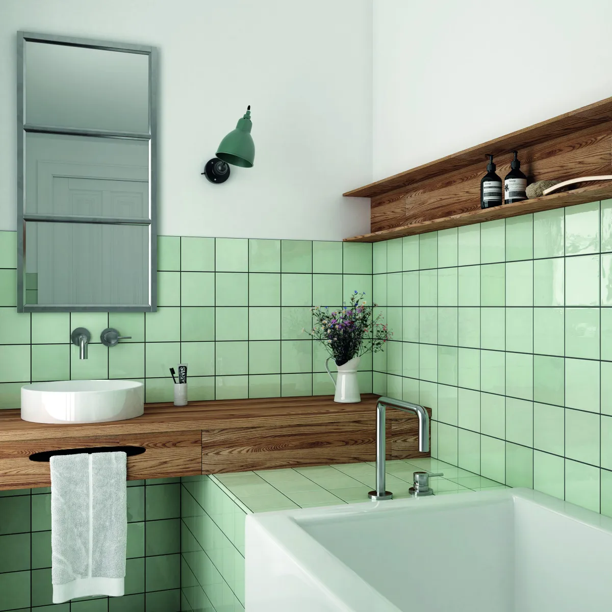 A dark grout allows these pale green tiles to take centre stage. Village Mint wall tiles, £29.99 per sq m, Tile Mountain