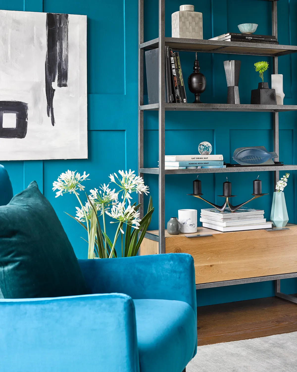 Bring bright cyan blue to life with pine furniture and fresh flowers. Image by Oak Furnitureland. 