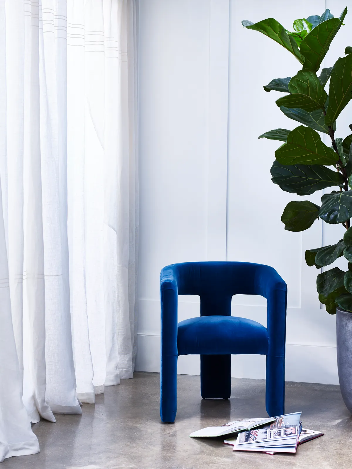 Statement cobalt furniture looks stunning against fresh white walls. Image by Oliver Bonas. 