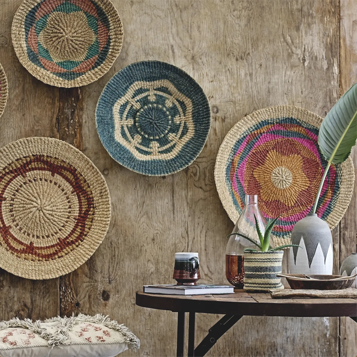 Make a feature of handicrafts and souvenirs from far-off places, by turning them into decorative wall art