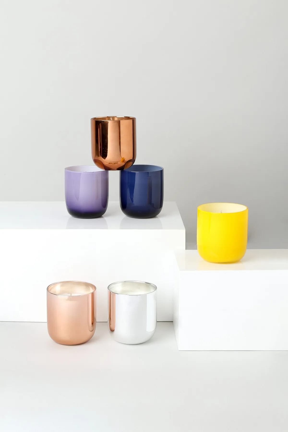 Pick a candle with a simple metallic holder for a luxe minimalist look. Jonathan Adler Bubbly Pop candle, £42, Sweetpea & Willow