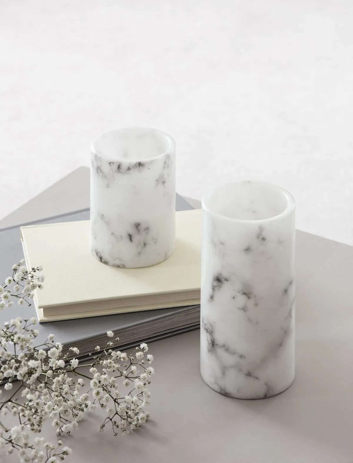 LED candles are perfect for busy households with little ones and pets. Marble LED candle duo, £9.99 for two, Lights4fun