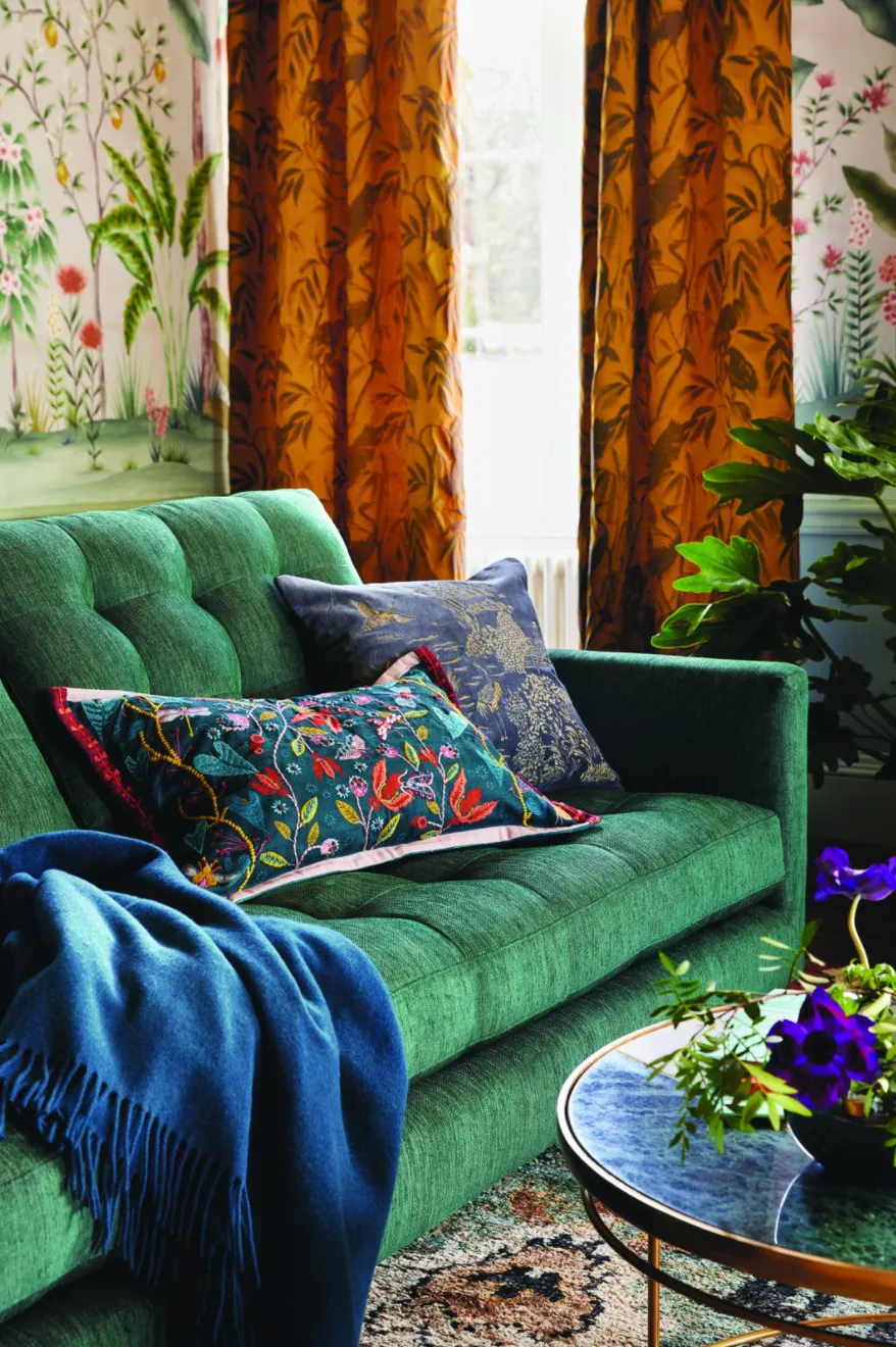 Draper 3-seater sofa, £1,699; plain wool throw in peacock, £80; flora & fauna cushion,£45; willow garden cushion in graphite, £45, all John Lewis & Partners