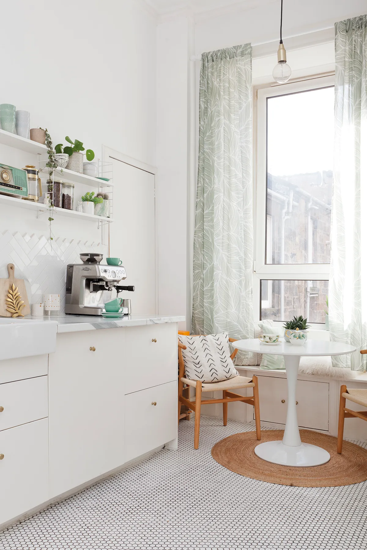 Kate’s picture-perfect kitchen has open shelving and a handy larder for storage. The open shelving gives plenty of opportunity to show off her collection of kitchenware, from mugs and plates to potted houseplants