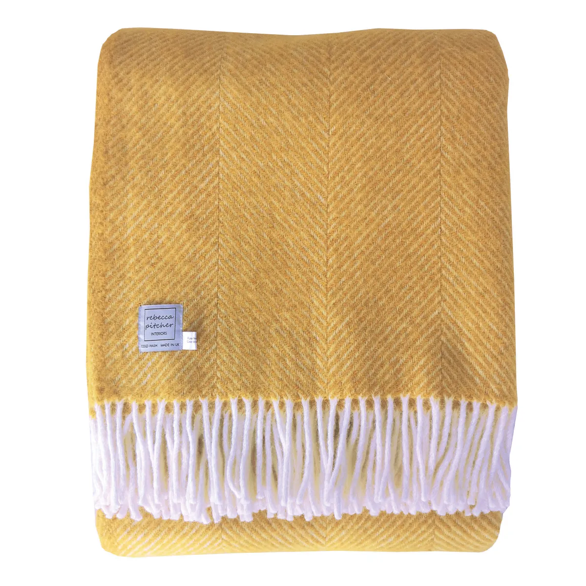 Large yellow wool throw, £65, Rebecca Pitcher