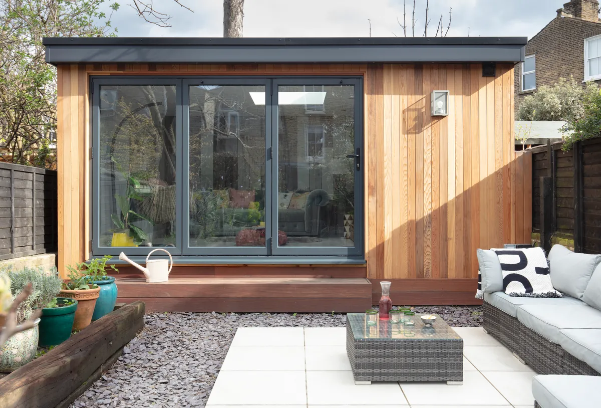 Garden room makeover: 'Vintage touches give our modern garden room character'