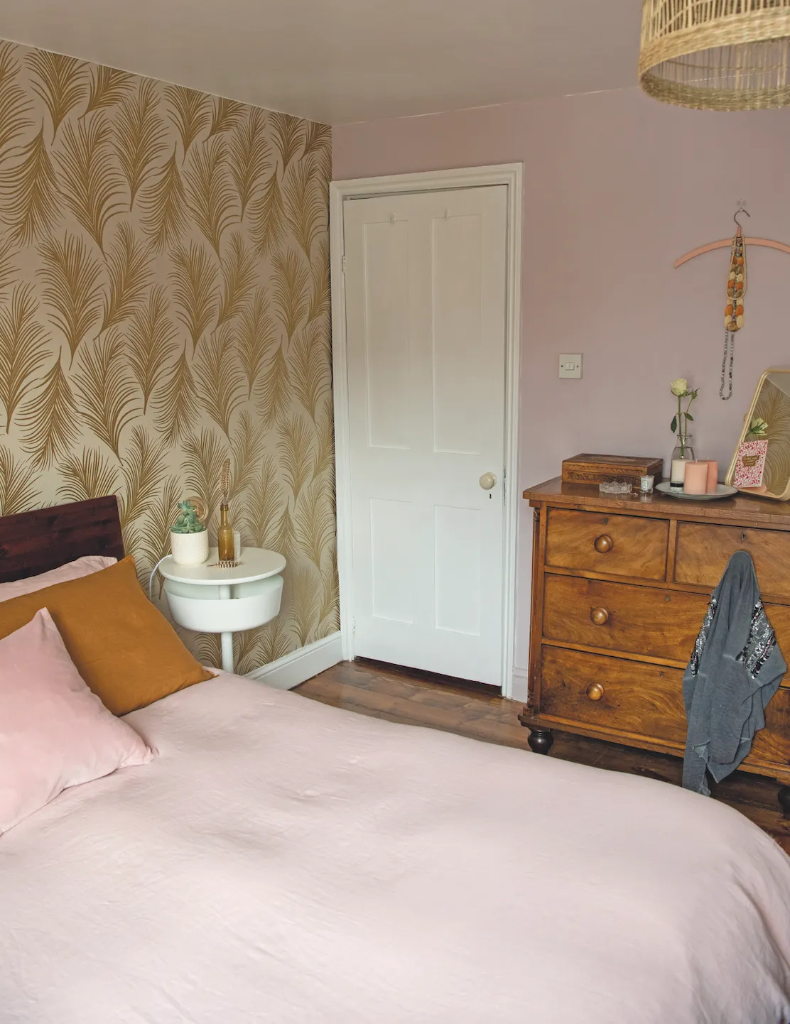 Real home - pink bedding and a vintage chest of drawers