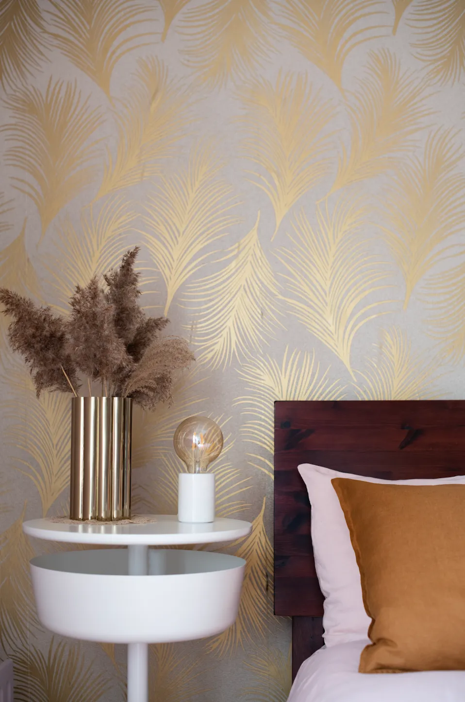 Real home - gold leaf motif wallpaper and pampas grass display