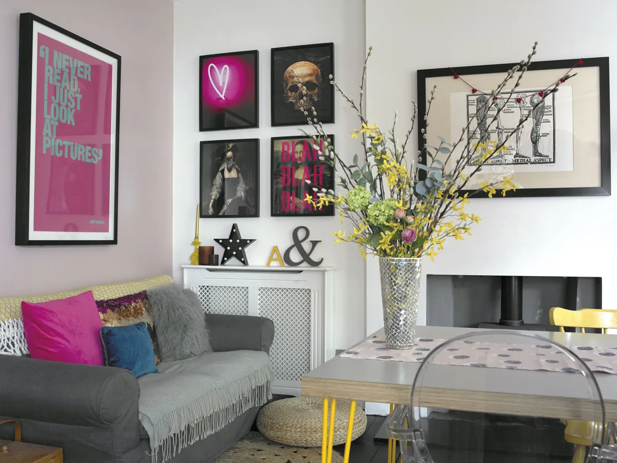 Lisa has used a lot of different shades of pink, but has complemented them with black and yellow, creating a bold, rather than feminine look. The transparent Louis Ghost chair, designed by Philippe Starck for Kartell, adds a designer touch to the eclectic room
