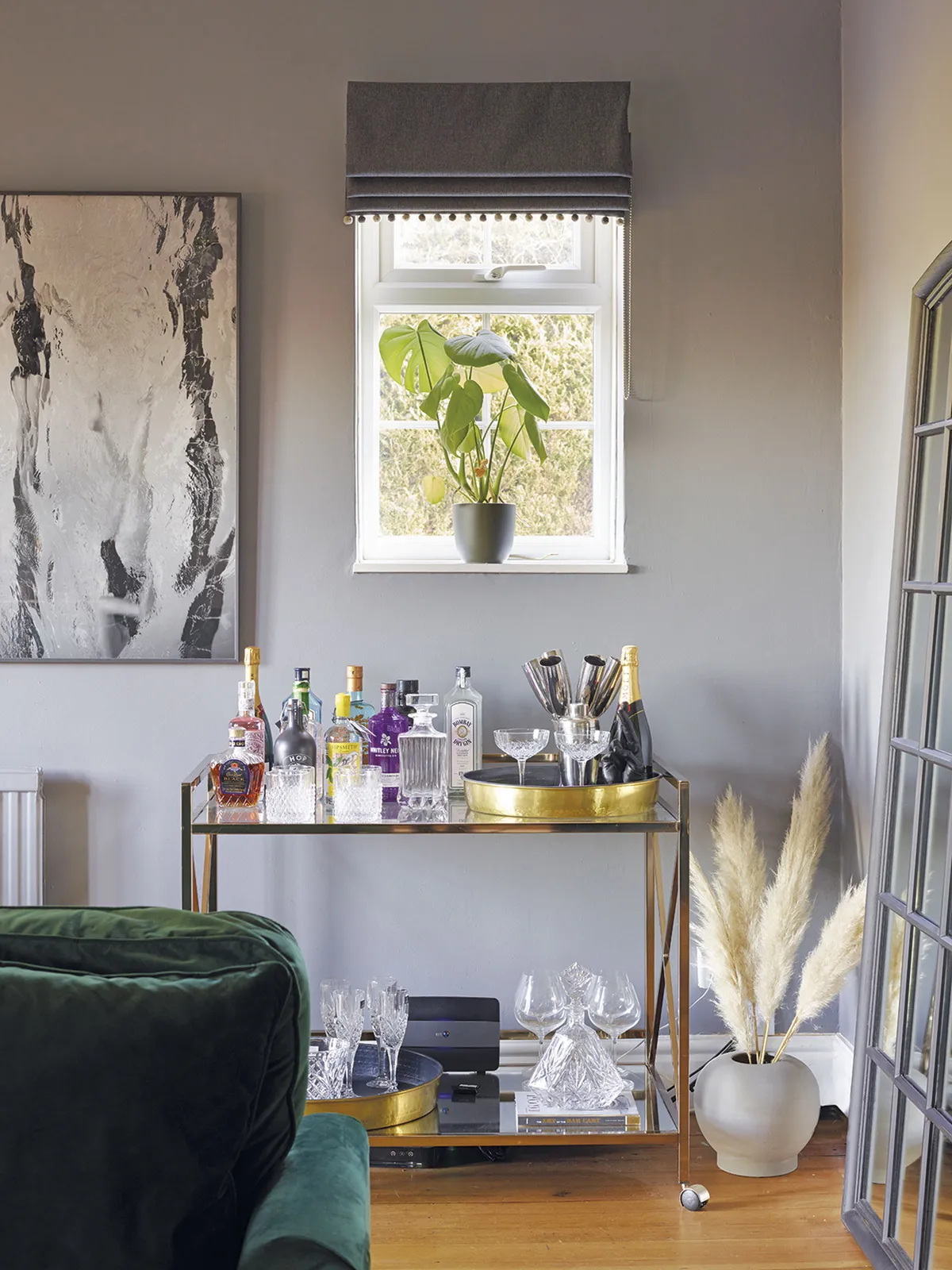 ‘To me a cocktail cabinet has a real sense of nostalgia,’ says Hayley. ‘There’s something so glamorous about a drink before dinner and I had romanticised the idea for ages,’ says Hayley. ‘Eventually I found this cabinet at a second-hand store for £100. The crystal pieces are on loan from Paul’s mum and dad’