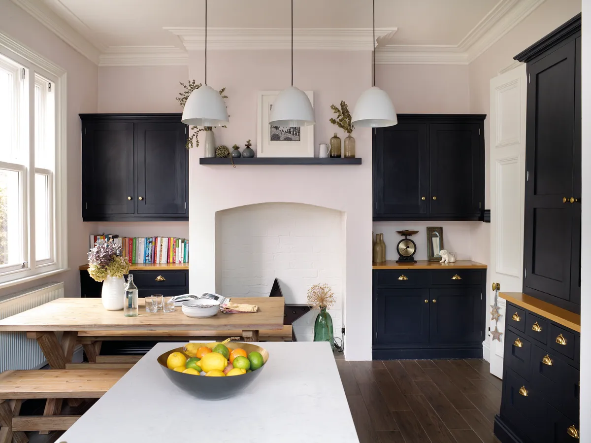 ‘The kitchen is my favourite room in the house. I love the high ceiling and the space it gives, and think the Lee Broom lights really bring this height to life’ says Sarah