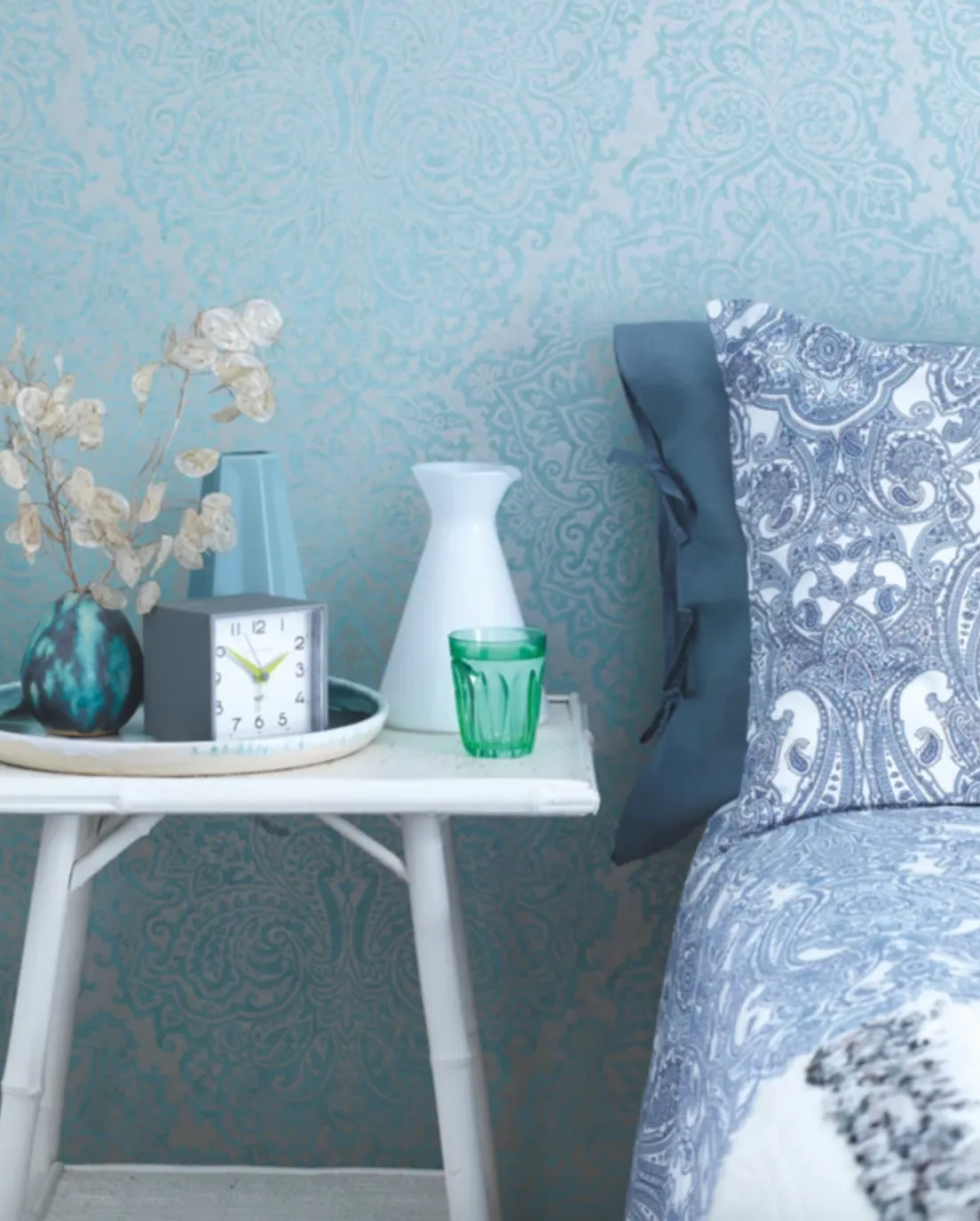 'As most of our collected bits and bobs are blue or green, the soft teal colourway was an easy choice,' says Sinead. See her home makeover.