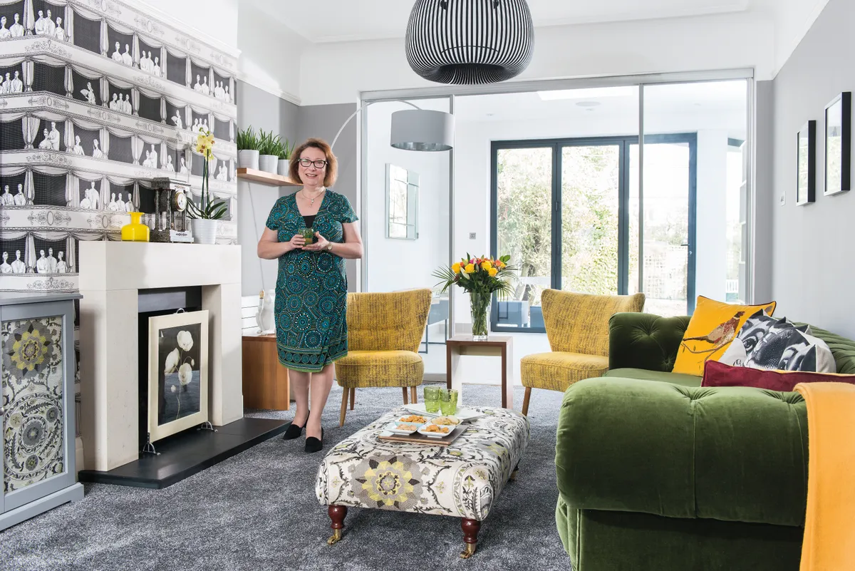 A living room that had become dull and dated has been turned into a space full of character and colour, with tactile seating and theatrical flourishes